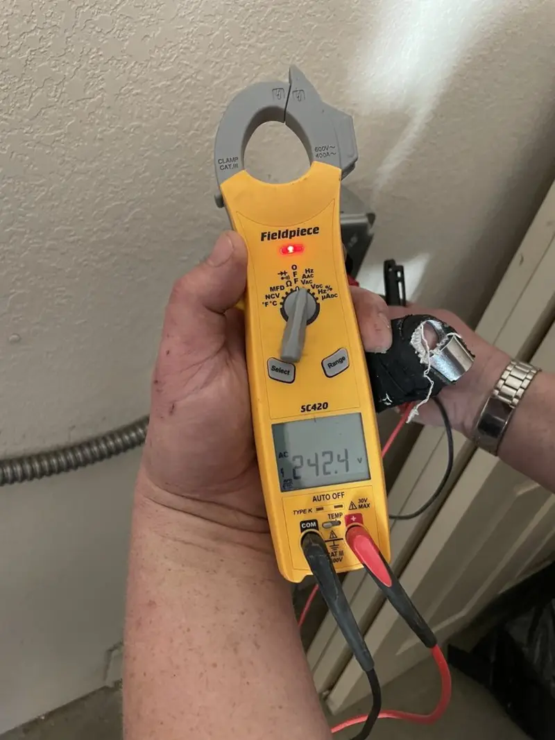 Voltage testing with clamp meter during Circuit Breaker Repair in Skippers Corner